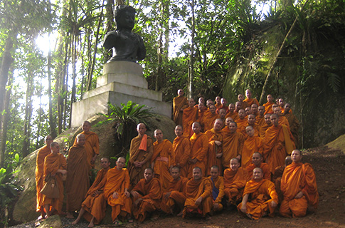 Avalokitesvara statue with Buddhist monks